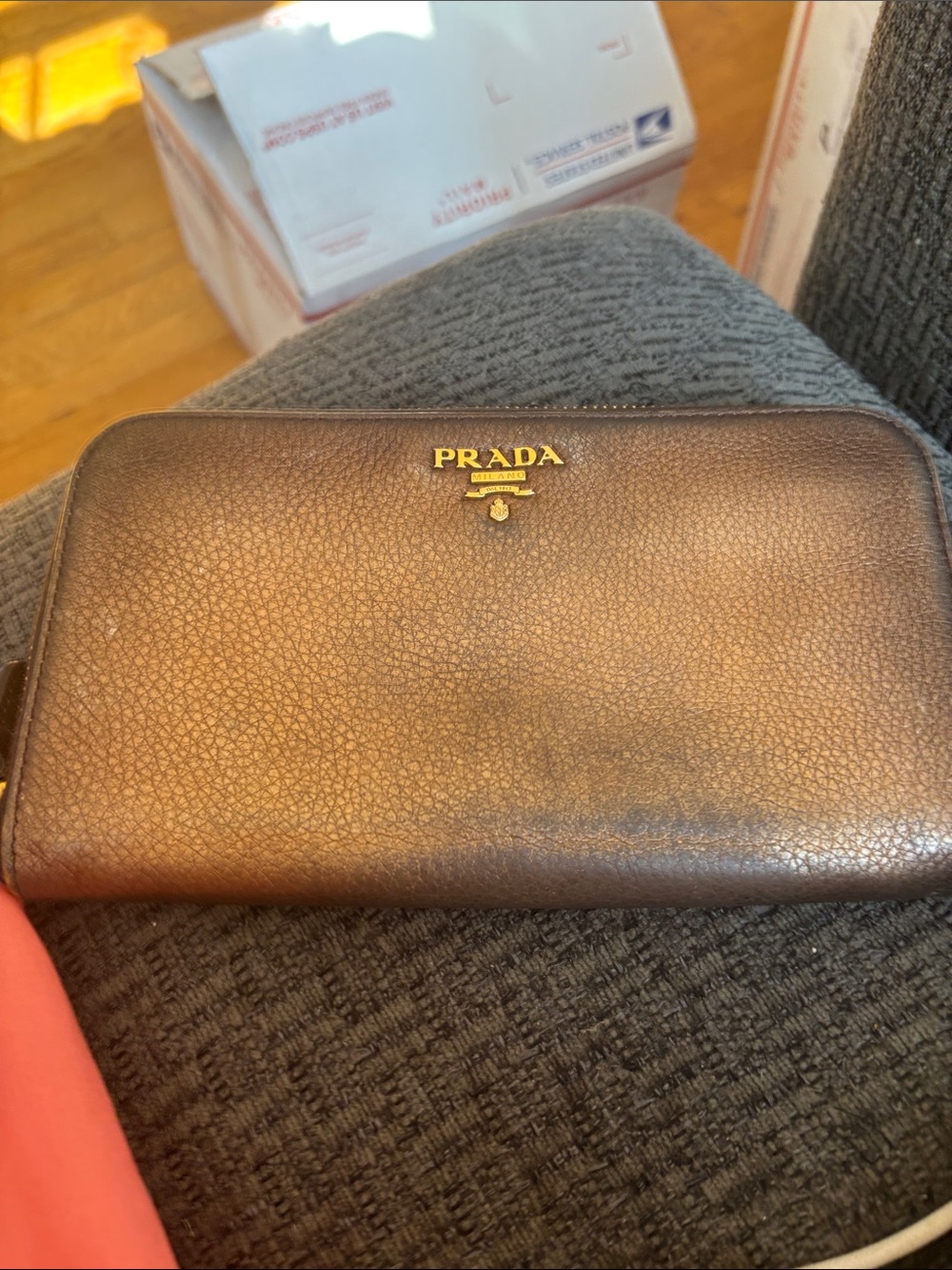 Prada Brown Pebbled Leather Zip-Around Wallet with Gold Logo